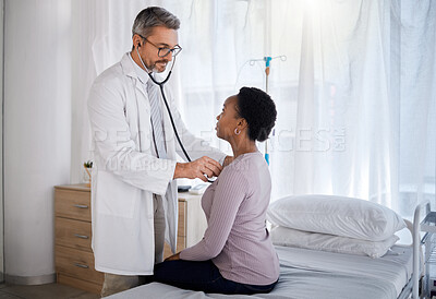 Buy stock photo Cardiology doctor consulting patient in hospital for heart test, healthcare and wellness with trust, innovation and insurance. Black woman in consultation with medical professional for pain in chest