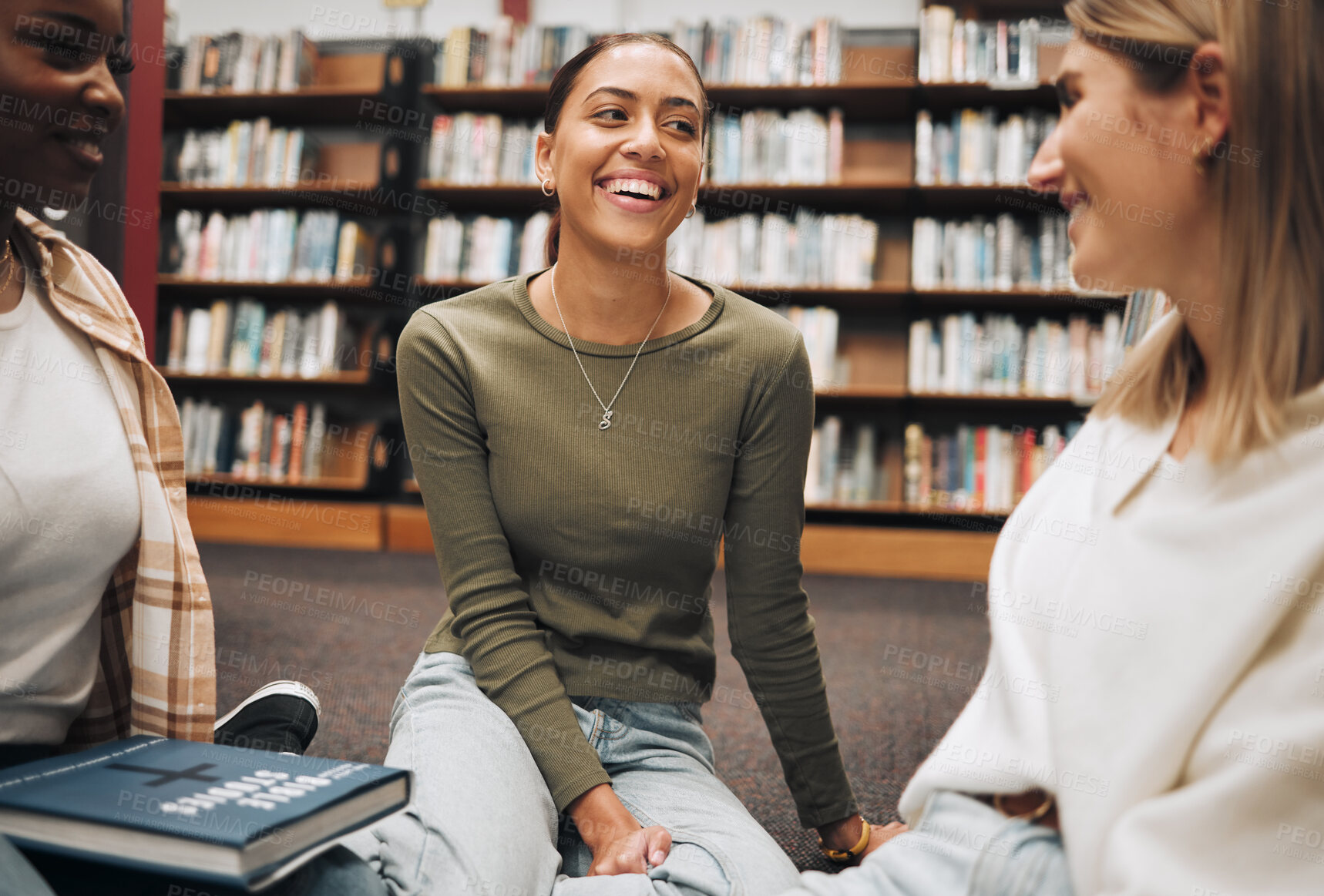 Buy stock photo Student, friends and book discussion in library with smile for education, learning or knowledge at university. Group of happy women enjoy conversation, book club or social study for research project