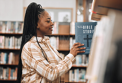 Buy stock photo Religion book, education and black woman in a library for research, studying God and knowledge on the bible at college. Learning, smile and African student with decision of books on a scholarship