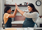 Cooking, high five and success with mother and girl in kitchen for cookies, bonding and pregnancy. Help, happiness and achievement with pregnant woman baking with daughter for support, food and goal
