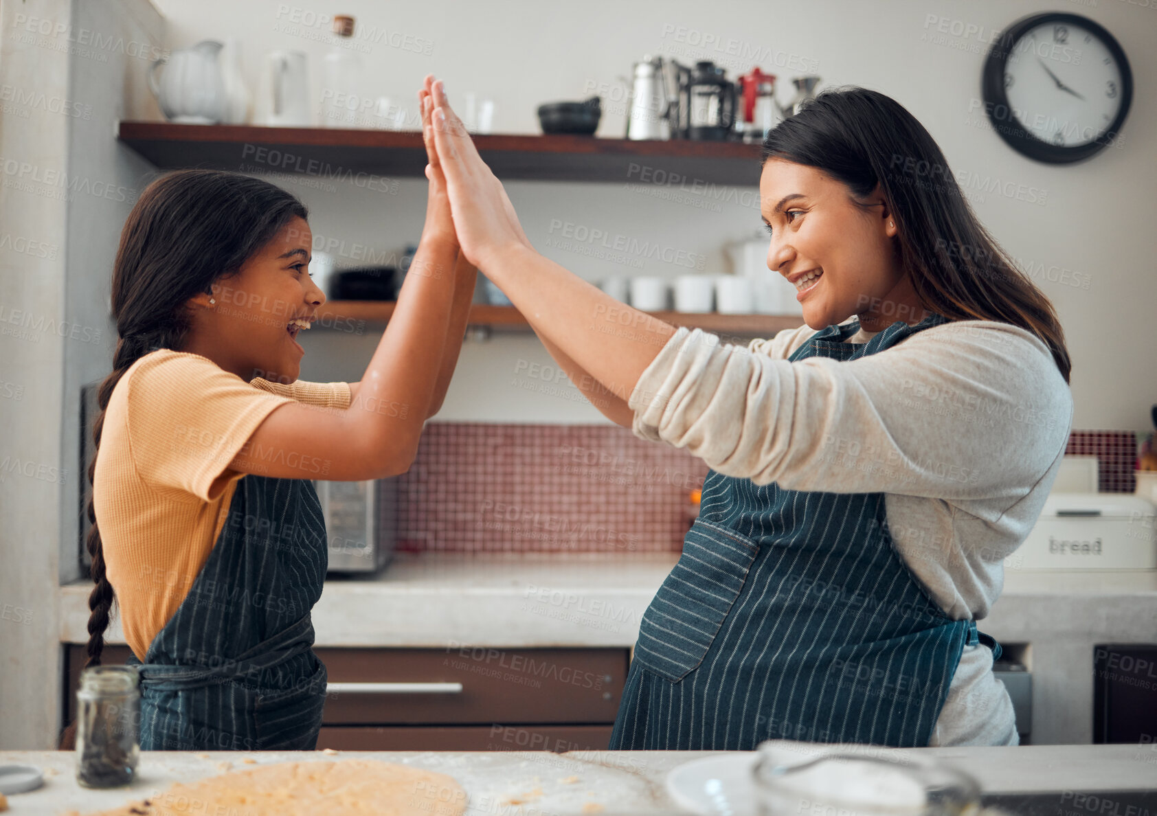 Buy stock photo Cooking, high five and success with mother and girl in kitchen for cookies, bonding and pregnancy. Help, happiness and achievement with pregnant woman baking with daughter for support, food and goal