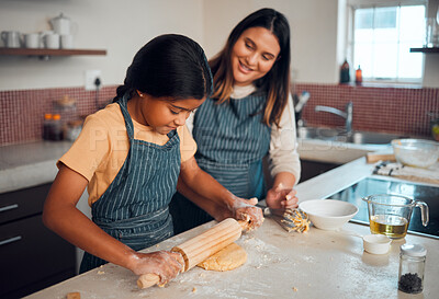 Buy stock photo Mom, girl and kitchen for teaching, rolling pin or cookies for baking, bonding love and family home. Mama, daughter and cooking for learning support, holiday or celebration for festive party in house