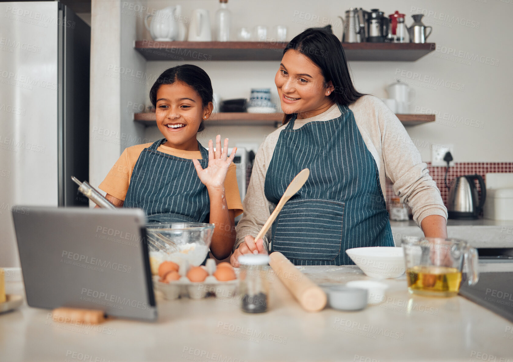 Buy stock photo Family, baking and tablet while child wave hello at video call, food blog or zoom with mother and daughter in home kitchen. Content creator or influencer woman and girl teaching cake recipe online