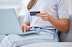 Banking, paying and online shopping with laptop and credit card by a woman at home. Casual female purchasing, buying and ordering products on the web or internet or a website with a app on ecommerce