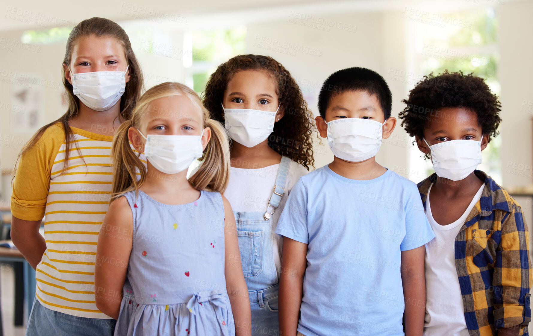 Buy stock photo School kids, education and covid while wearing face masks in a classroom for protection against covid. Portrait of cute, young and smart students in safe learning and educational environment together