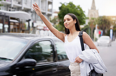 Buy stock photo Business woman call a taxi or transport in the city street in the morning while commute to work. Friendly corporate worker hand and arm wave for a cab in a urban town and road in busy traffic