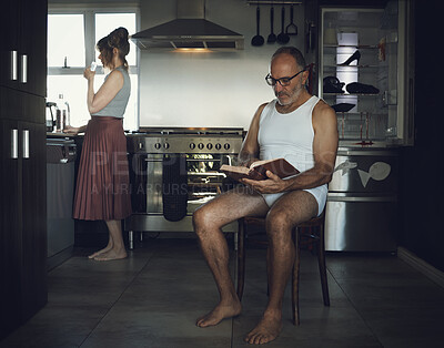 Buy stock photo Marriage, problem and mental health issue with bored old couple in toxic, dark or sad family home kitchen together. Divorce, alcoholic and depression married relationship with broken household