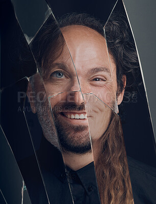 Buy stock photo Mental health, personality disorder, schizophrenia or bipolar. Portrait of different horror face in a broken mirror of smile, split or creepy weird smiling expression or reflection on a glass surface