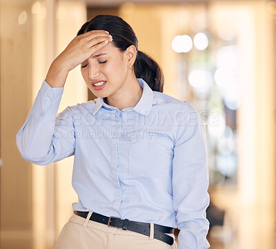 Buy stock photo Stress, sick and tired business woman with a headache feeling sad and unhappy at work. Young female employee or worker suffering from a migraine and is depressed, overworked and burnout 