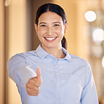 Thumbs up hand sign for success, employee motivation and excited business woman in an office at work. Portrait of a happy, smile and professional corporate manager, boss or worker at startup company