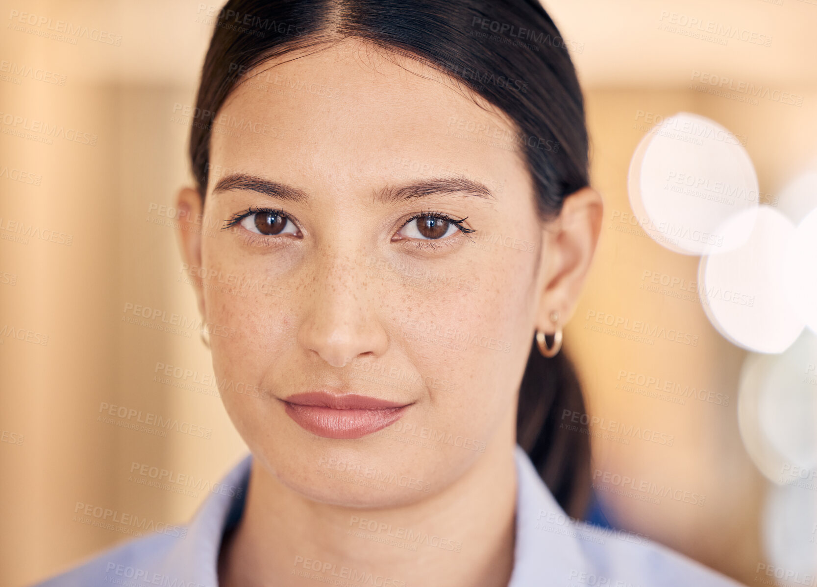 Buy stock photo Skin, face and beauty with a confident, serious and focused woman inside on a blurred background. Skincare, head and closeup of a young female indoors with perfect, flawless and glowing complexion