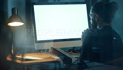 Buy stock photo Business man doing web design on computer at work, designer planning website online and working on advertising strategy in a dark office at night. Programmer doing overtime and programming on screen