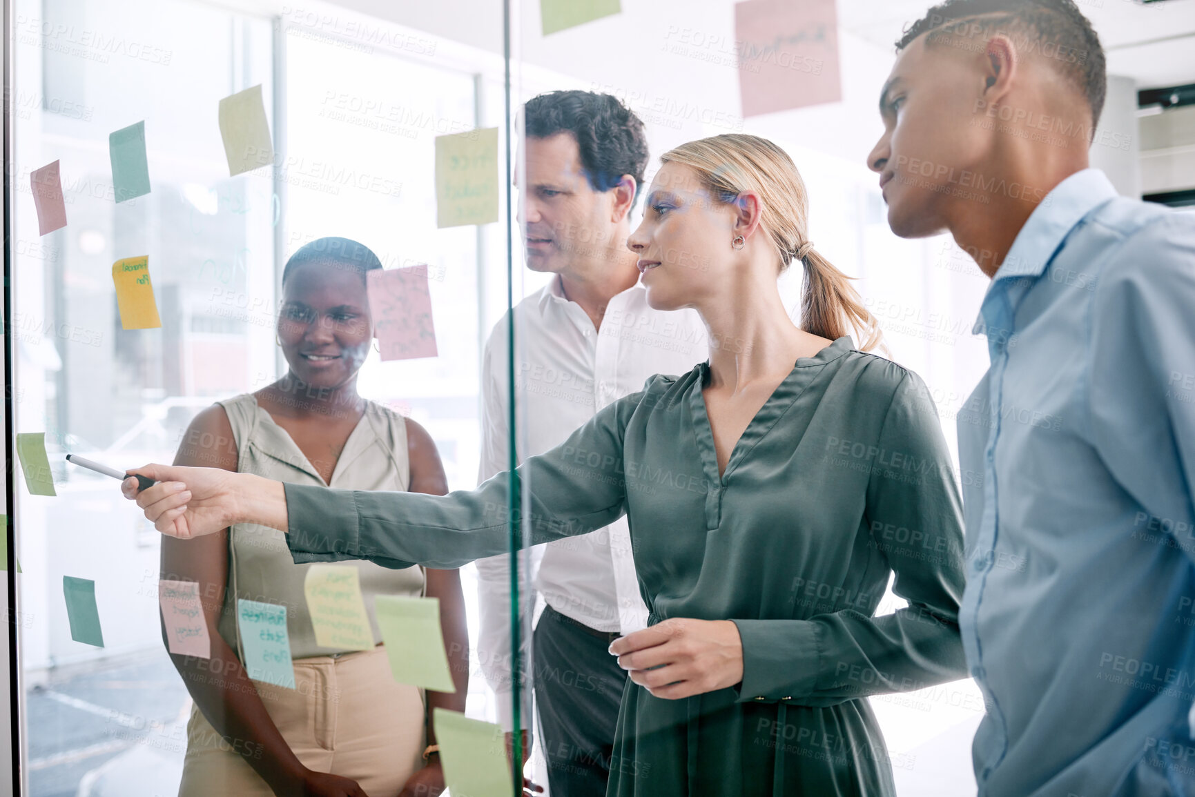 Buy stock photo Vision, innovation and thinking with business people planning on sticky notes in an office. Creative teamwork collaboration on a goal and target while discussing a mission, design or target together