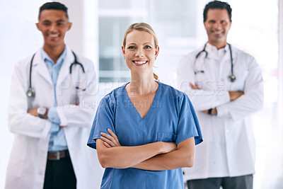 Buy stock photo Portrait of medical doctors with crossed arms with a stethoscope standing in the hospital hallway. Happy healthcare workers after clinic trial, surgery or consultation success at a medicare center.