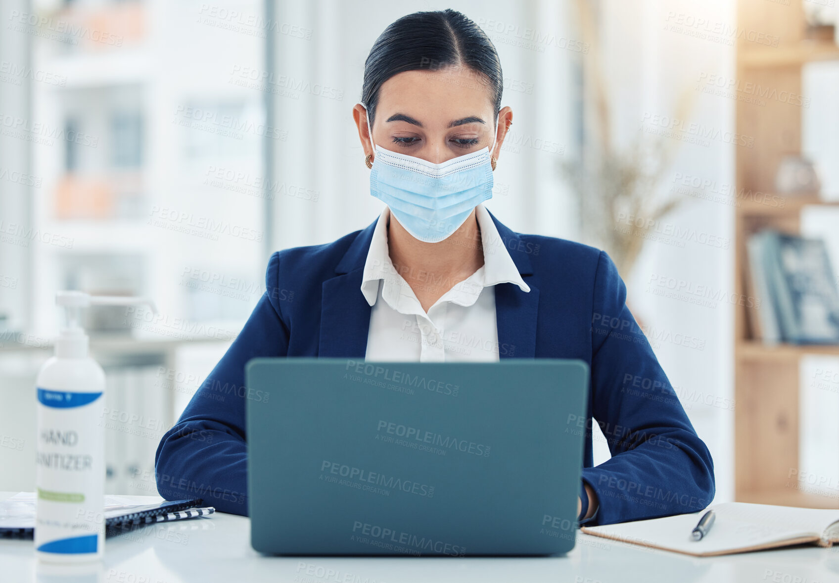 Buy stock photo Face mask, covid and business woman with laptop in safety, security and strategy to stop global virus in office. Employee and compliance worker against bacteria spread at company desk with technology