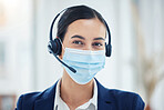 Call center, support or covid help worker with mask for safety and corona protection at work. CRM business  telemarketing or customer service consultant consulting on covid 19 contact us question