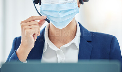 Buy stock photo Customer support, crm and covid compliance with face mask and an agent in office or center. Operator practice safety during online communication and advice. Woman working in hygiene, safe workplace