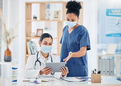 Buy stock photo Covid, mask and tablet with a doctor and nurse in the hospital doing research online for diagnosis and treatment. Teamwork, collaboration and meeting with medical staff in a clinic for healthcare