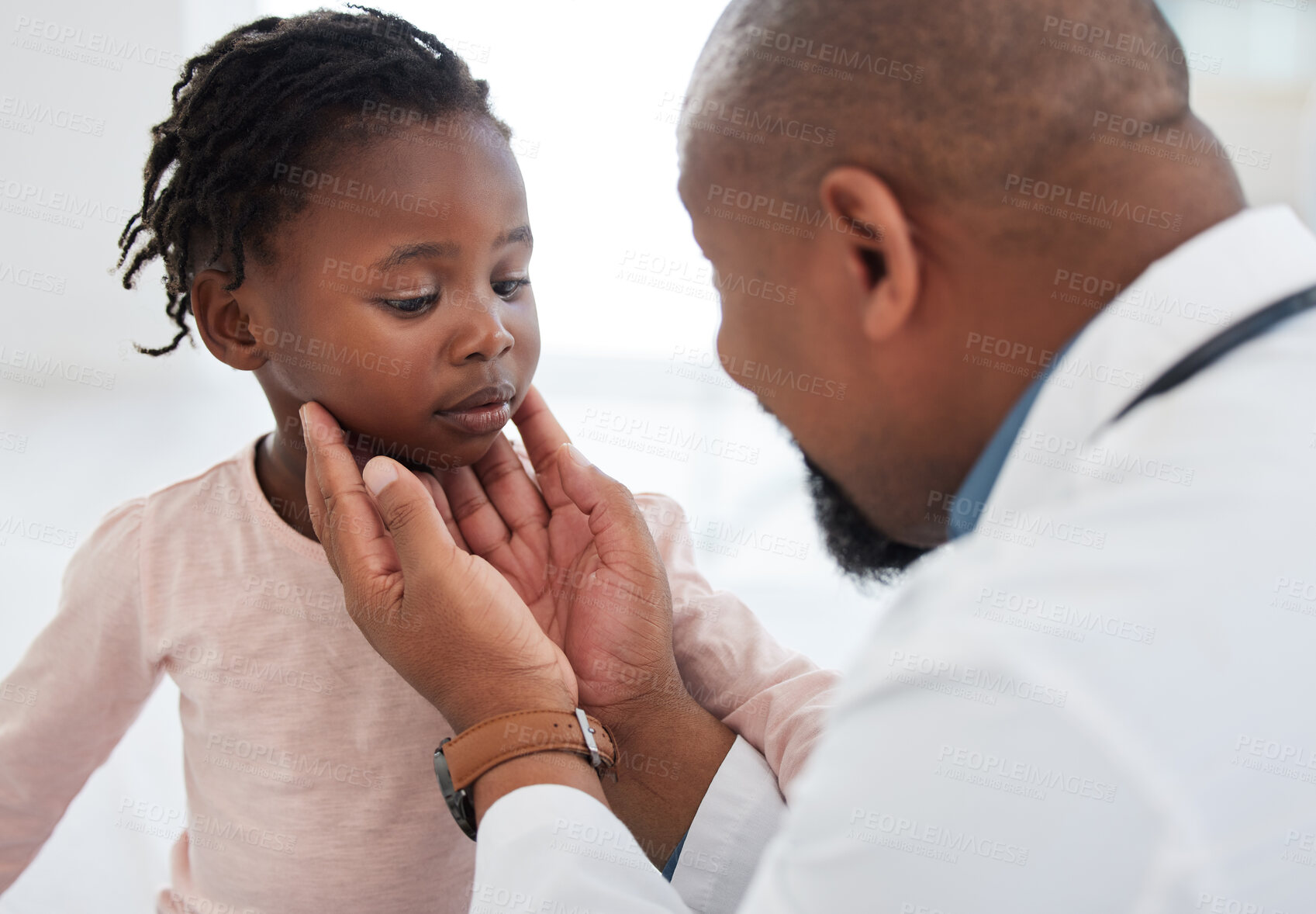 Buy stock photo Medical doctor checking a girl throat with care in his office at a modern surgery center. Man pediatrician touching the patient's neck during healthcare, medicare and illness consultation at clinic