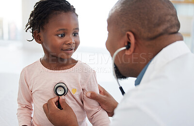Buy stock photo Healthcare, pediatrician and child heart doctor with a patient at hospital, exam on chest with a stethoscope. Black girl smile at pediatric surgeon, talking to a friendly, caring physician she trust