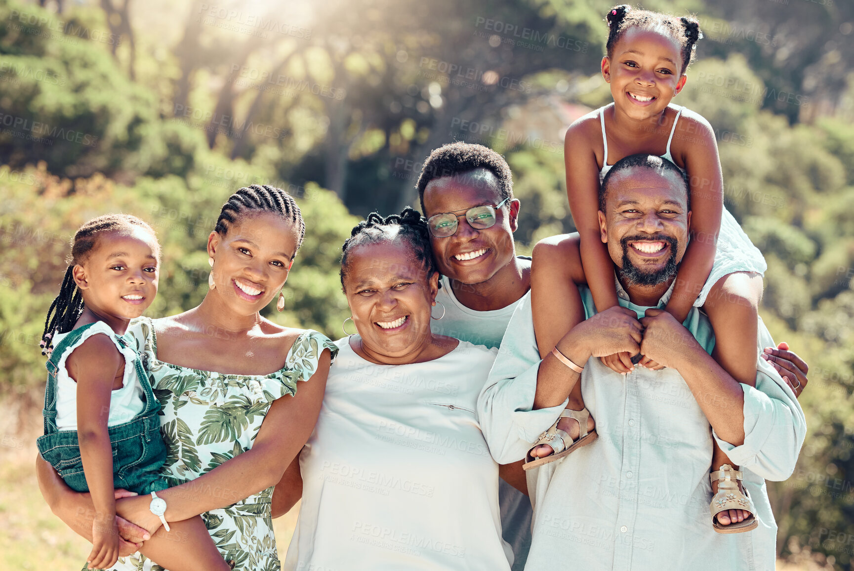 Buy stock photo Face portrait of family in nature park, parents in garden with children and senior people with smile on group walk in summer. Smile, happy and African kids in green yard with mother and father