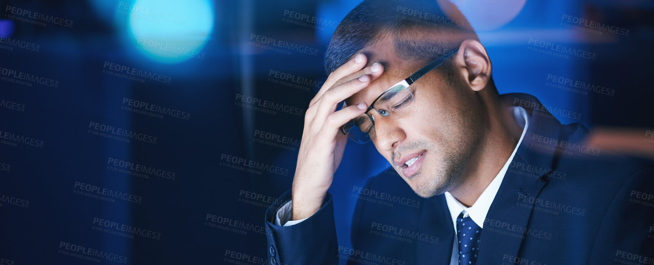 Buy stock photo Headache, burnout and stress business man working late in corporate office. Workaholic feeling the pressure of workload and deadline, frustrated and suffering with migraine and exhausted by overtime