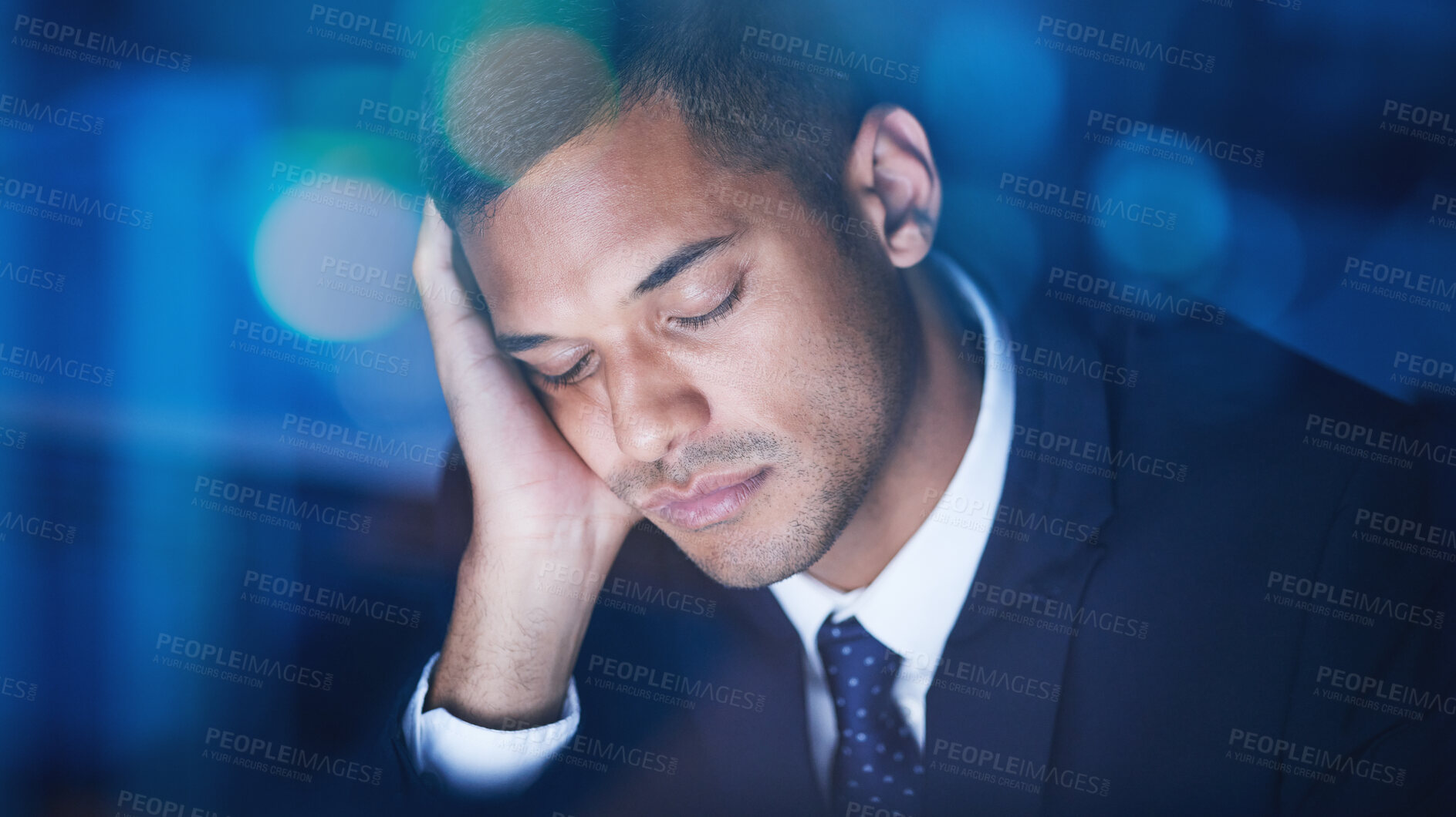 Buy stock photo Tired, overworked and exhausted businessman sleeping while working overtime in the office at night. Fatigue, burnout and lazy corporate manager sitting at desk and taking nap in the company building.