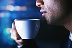Coffee, relax and man breathing in aroma of beverage after work in bokeh at night. Break, face and person taking in aromatic smell or tasting delicious fresh espresso, caffeine or cappuccino.
