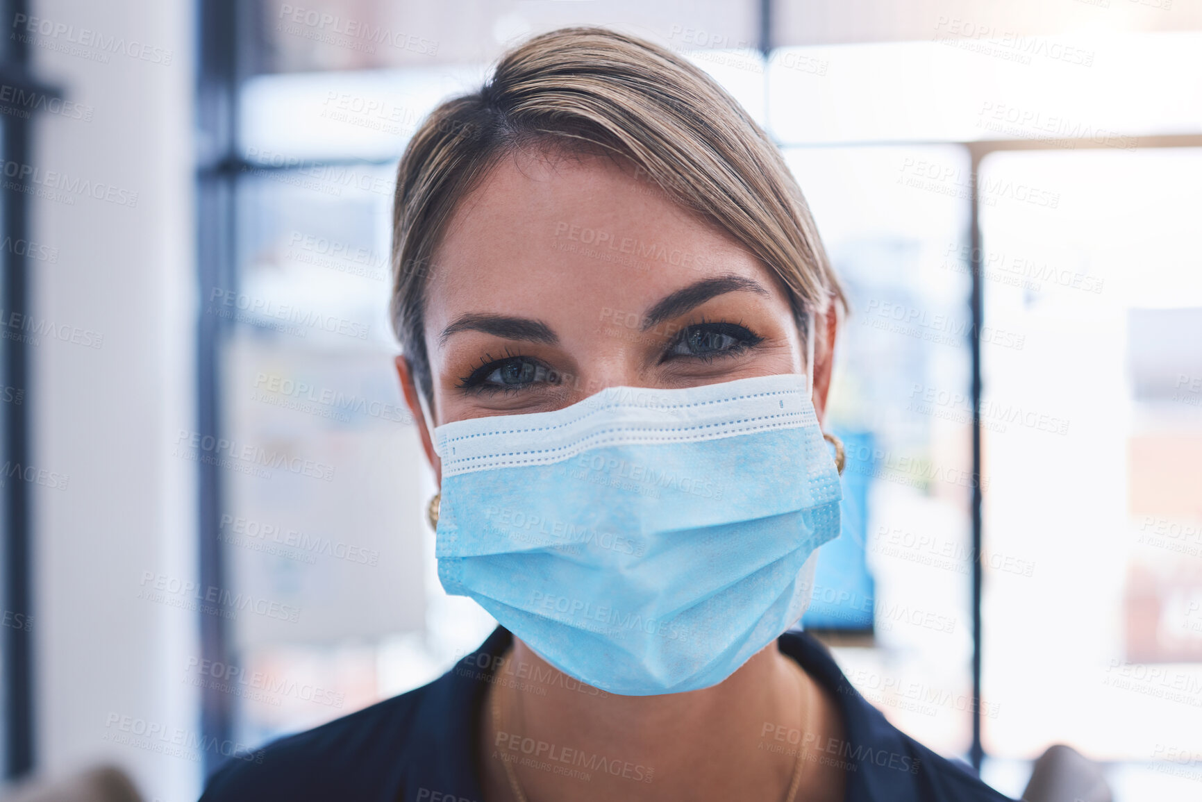 Buy stock photo Covid, face and mask with a woman taking safety precaution for health and wellness inside during the corona virus pandemic. Restrictions, regulations and social distancing with a young female