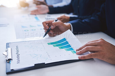 Buy stock photo Marketing chart graphs, sales and advertising goals or projections checklist and paperwork results by the manager. Employee reading financial profit data analytics while planning a finance strategy
