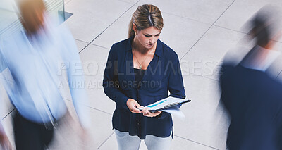 Buy stock photo Business employee reading paperwork, crowd of people walking fast and serious corporate white woman stopping in lobby hall. Busy office building, hold company documents and people traffic blur motion