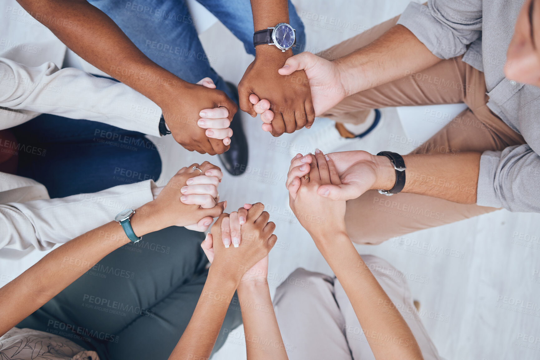 Buy stock photo Support, prayer and trust with hands of people praying in spiritual faith and comfort in a meeting from above. Help, hope and worship with a group sitting in a circle of community and mental health