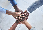 Diversity, partnership and global hands stack of men and women in a company. Team building, support and business people in collaboration using teamwork to set, mission, vision and sale goals top view