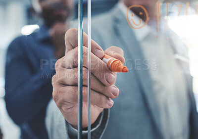 Buy stock photo Project manager hand planning a strategy or writing notes on a glass. Businessman brainstorming and thinking of ideas in his presentation. Corporate male entrepreneur being innovative in an office