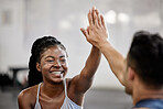 High five, fitness team and gym success of friends in happy exercise workout together for health and wellness. Black woman with smile, excited and goal in teamwork celebration with her training coach