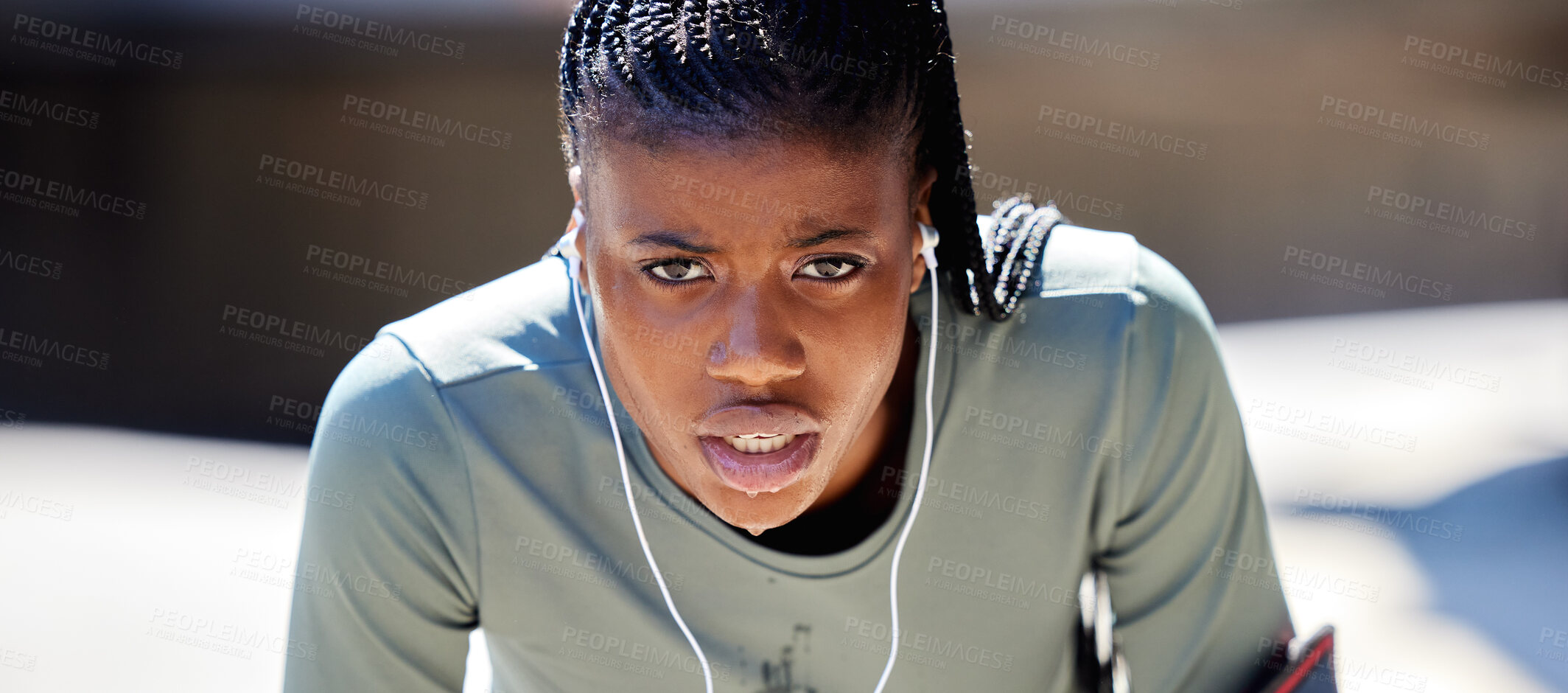 Buy stock photo Runner, workout and exercise athlete tired after running or training for a marathon with earphone. Health, wellness and motivation or healthy and strong fitness black woman relax after sports cardio