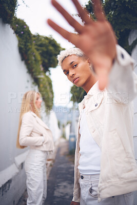 Buy stock photo Fashion, model and gen z man from Guatemala in a alley outdoors pose for a luxury brand. Attractive, spanish and hip young millennial person with a serious, modern and cool look in a urban space 