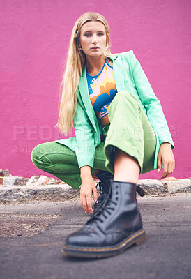 Buy stock photo Fashion content creator and social media influencer in neon clothes and cool modern pose outdoors on the road. Photography, green and portrait of a young woman on the city street against a pink wall