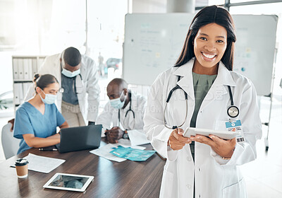 Buy stock photo Portrait of happy doctor with digital tablet in a planning meeting with healthcare workers in an office. Medical expert research on laptop during teamwork, collaboration and support strategy online