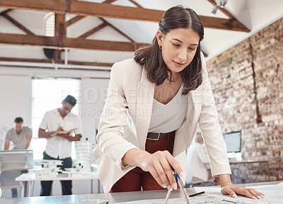 Buy stock photo Architect, blueprint and design with a woman engineer working on a plan in her office at work. Construction, designer and architecture with a female creative working on building plans for development