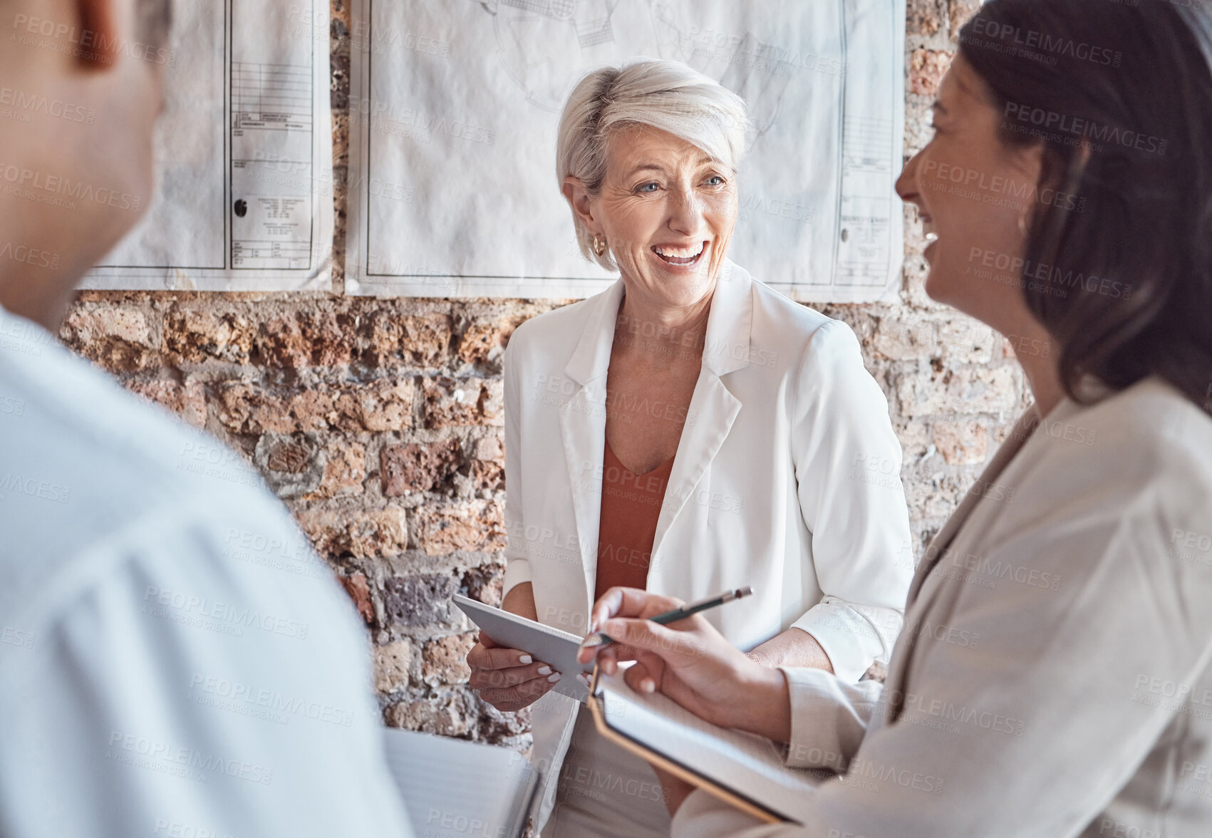 Buy stock photo Laughing, funny and happy business people having a meeting and making a silly joke while planning ideas and talking about a strategy. Leadership, teamwork and collaboration on a creative project