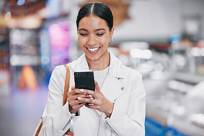 Buy stock photo Happy woman with phone reading funny social media meme on the internet while in a mall. Female with a smile while for discount coupon or texting a contact on a mobile smartphone after retail shopping