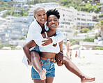 Gay, lesbian and lgbt with a woman couple bonding together on the beach outside during summer. Romance, dating and love with a female and her girlfriend on holiday, vacation or honeymoon by the coast