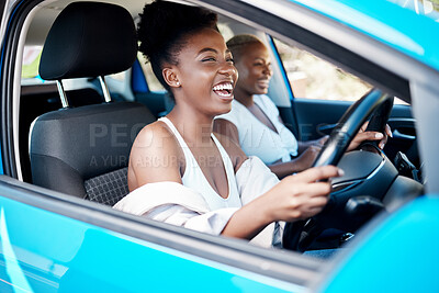 Buy stock photo Woman driving, friends and roadtrip for a fun and happy drive while enjoying their vacation, trip and journey together. Black women laughing and talking while sitting in car for an adventure or lift