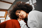 Sad, burnout and depressed woman sitting and thinking on the floor in a room alone at home. Burnout, stress and lonely girl with mental health, psychological or relationship problems laying on hands.