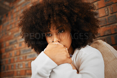 Buy stock photo Fear, sad or depression of a young woman sitting with depressed expression or thinking of a problem. Worried and alone african American woman after a bad fail, anxiety or mental health issues 