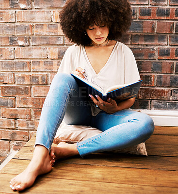 Buy stock photo Woman reading books, story and study at home for relaxed learning, studying and education. College student, young black person on ground and interesting story for research, literacy and knowledge