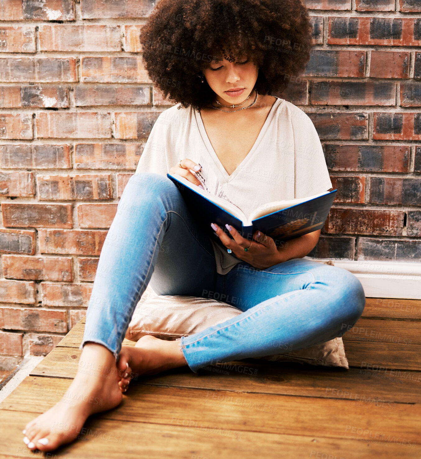 Buy stock photo Woman reading books, story and study at home for relaxed learning, studying and education. College student, young black person on ground and interesting story for research, literacy and knowledge