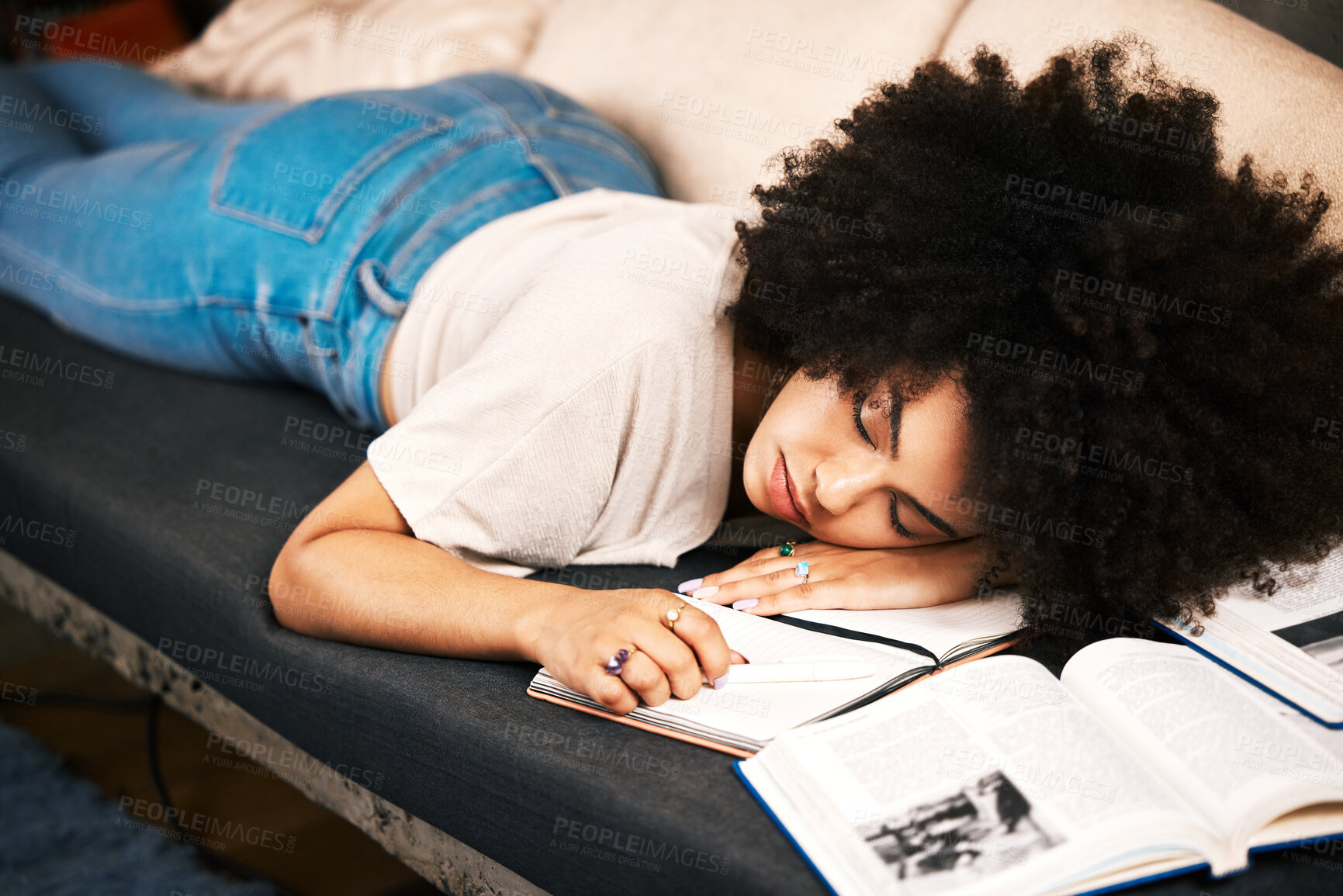 Buy stock photo Education, learning and sleeping with a tired, exhausted and overworked woman student studying on a sofa in her home. Burnout and exhaustion with a female learner in her house to study and learn