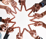 Teamwork, collaboration and star hand sign of business people for goal, mission and achievement success. Group diversity hands together with v sign or peace symbol for unity, trust and support below